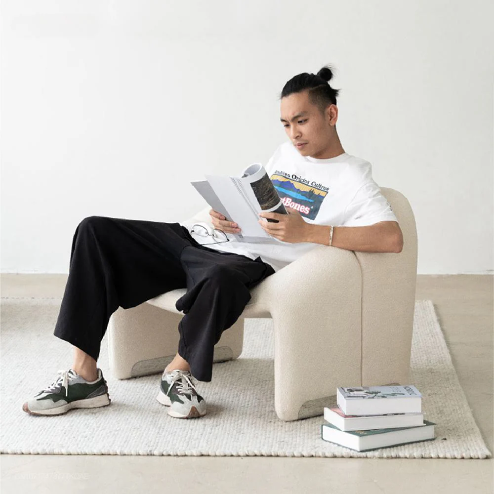 Bequemer Design-Sessel mit geschwungener Sitzfläche Sloopy|DIIIZ – Diiiz