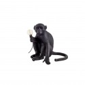 Monkey seated table lamp