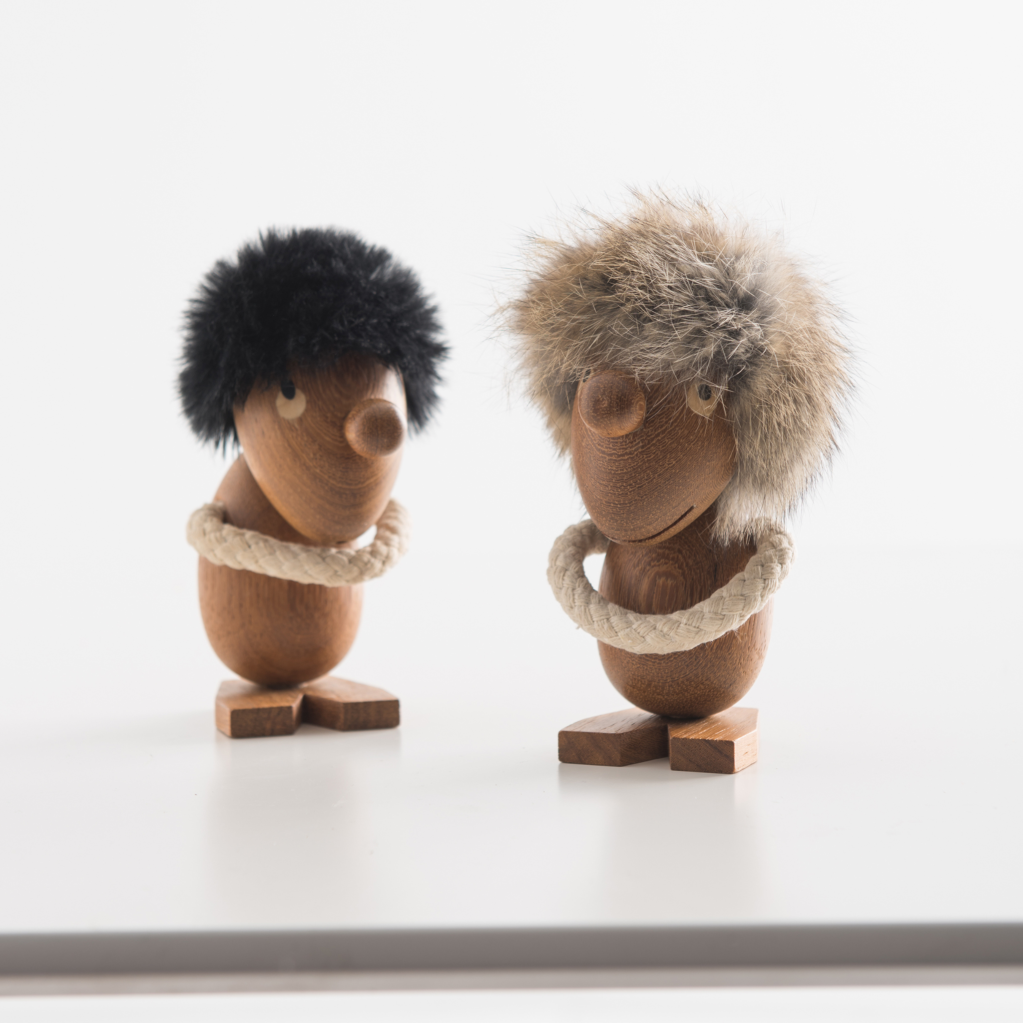 Figurines Opitmist & Pessimist inspired by Hans Bolling
