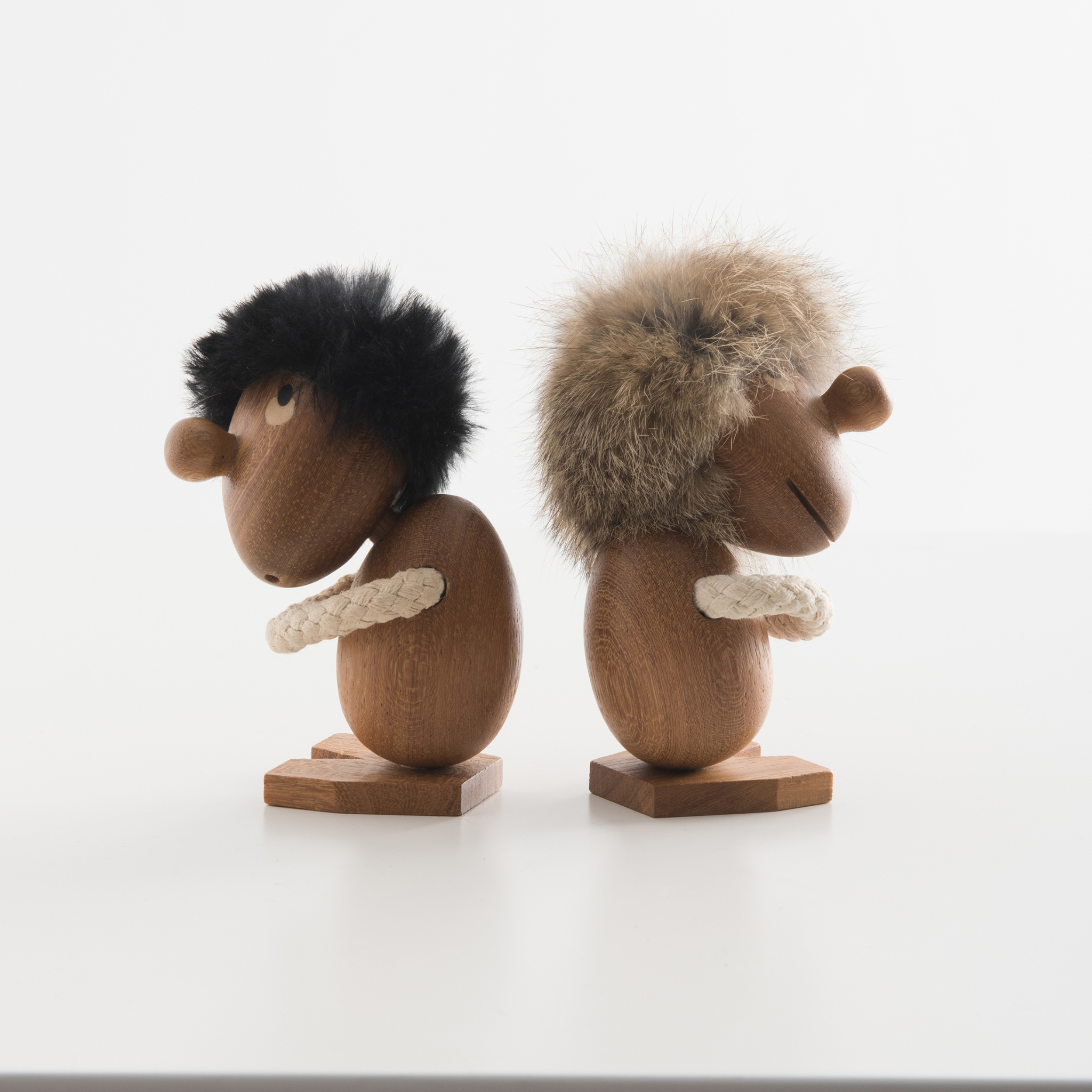 Figurines Opitmist & Pessimist inspired by Hans Bolling