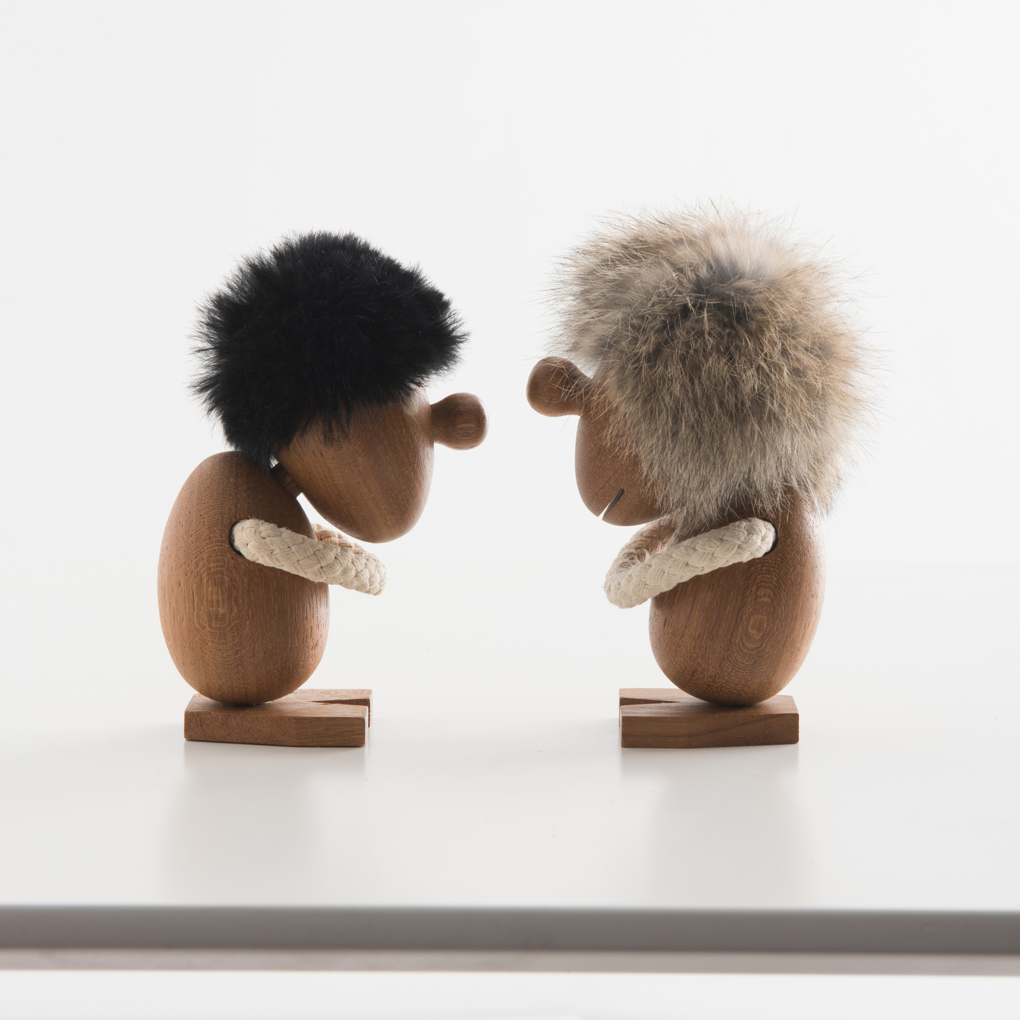 Figurines Opitmist & Pessimist inspired by Hans Bolling