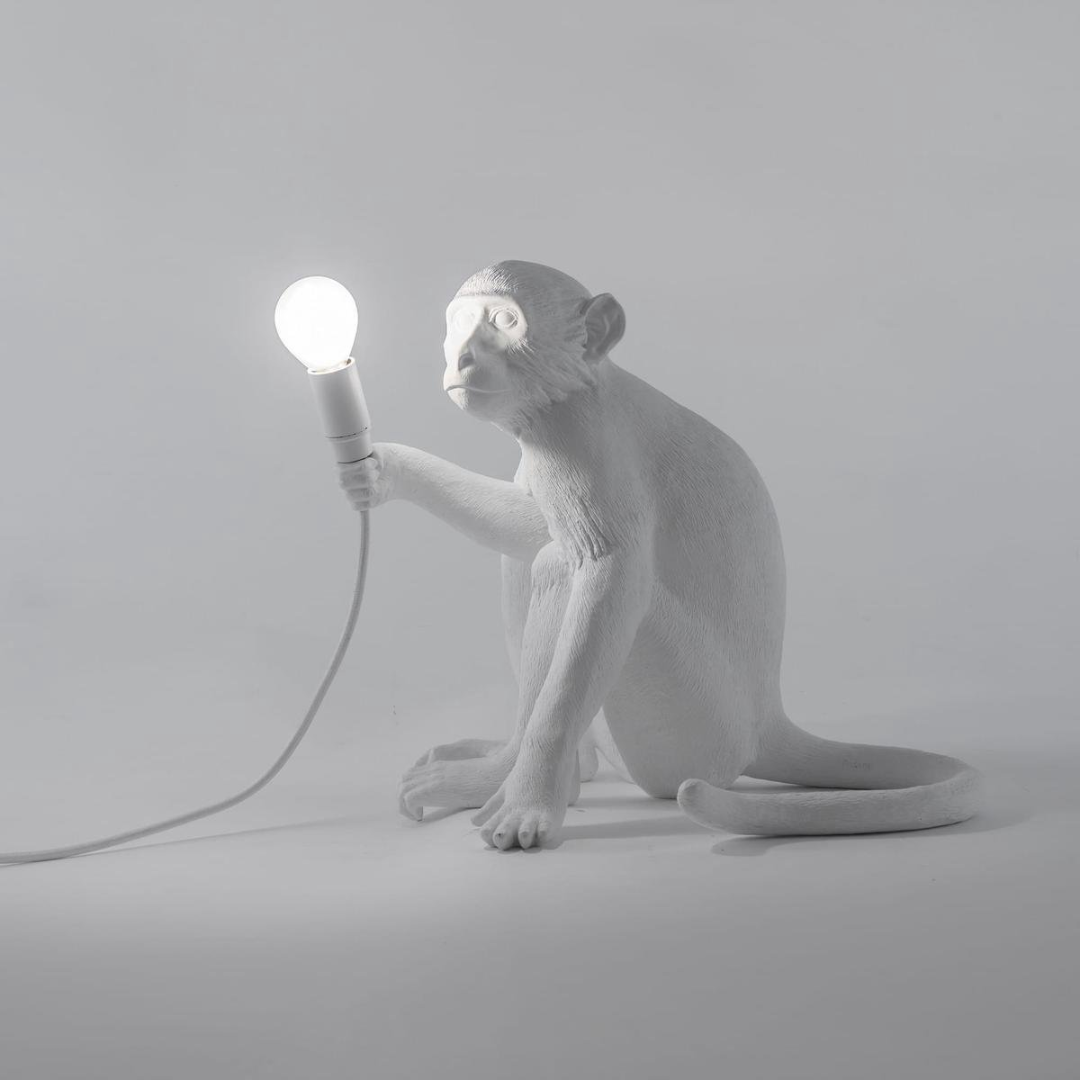 Monkey seated table lamp