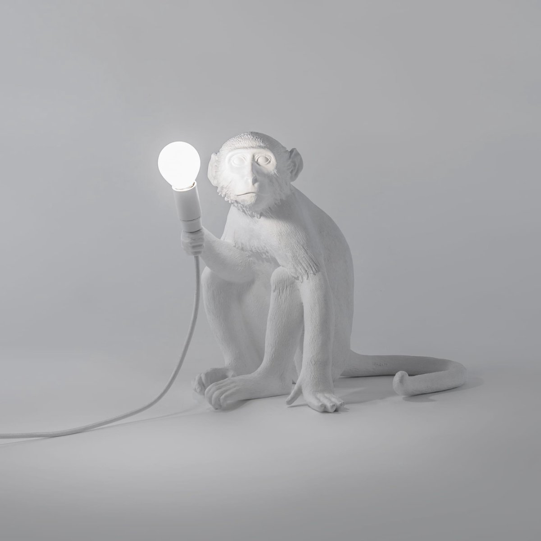 Monkey seated table lamp