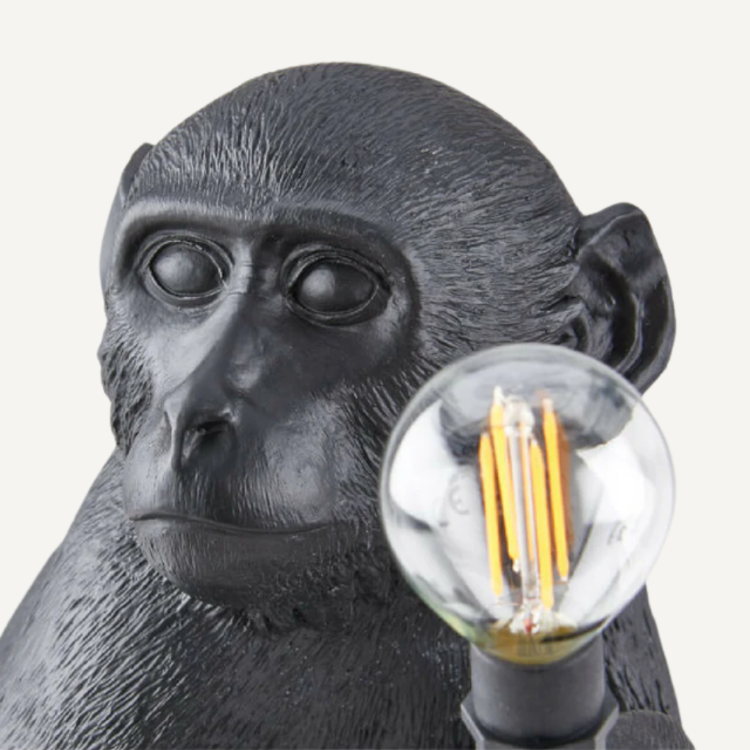 Monkey seated table lamp